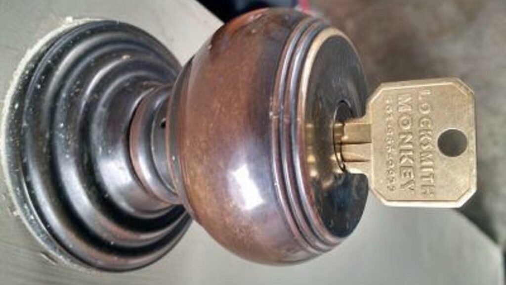 key inside a brown home lock rekeying
