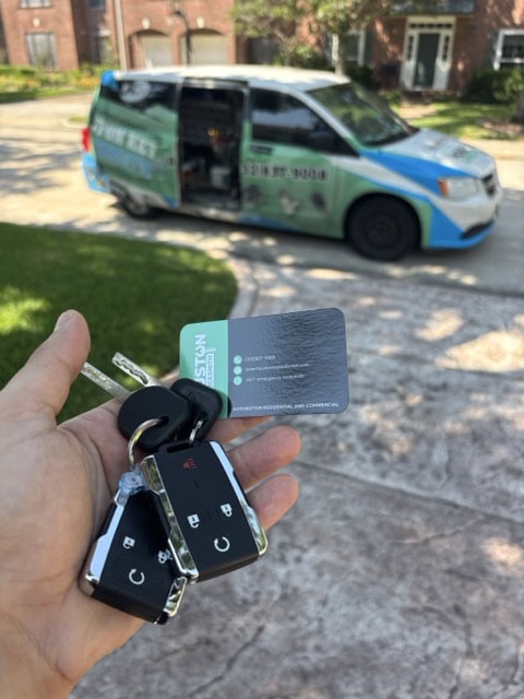 Car key replacement Katy TX โ Houston Key Locksmith technician programming remote and a key