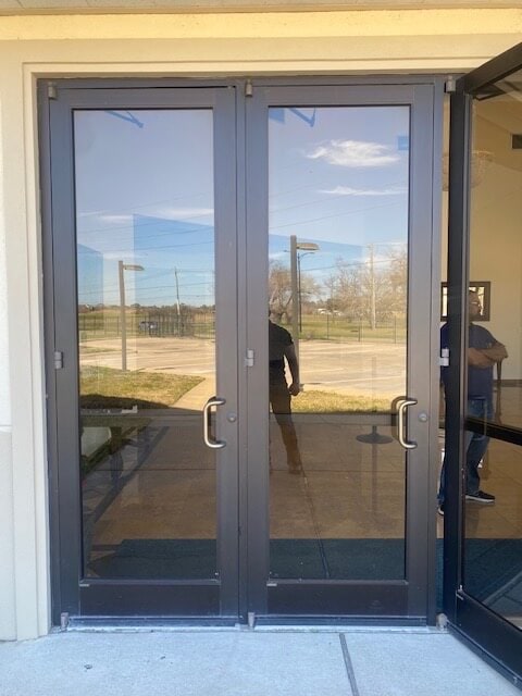 Commercial locksmith installing high-security lock at Katy business – Houston Key Locksmith