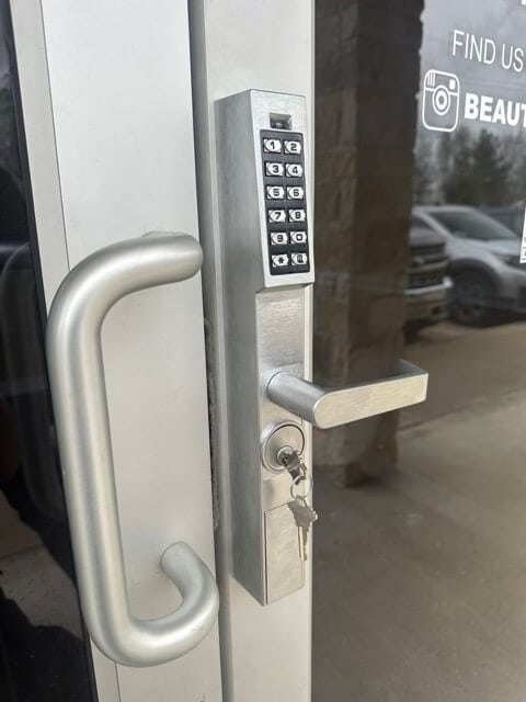 Commercial locksmith installing high-security lock in Sugar Land office – Houston Key Locksmith
