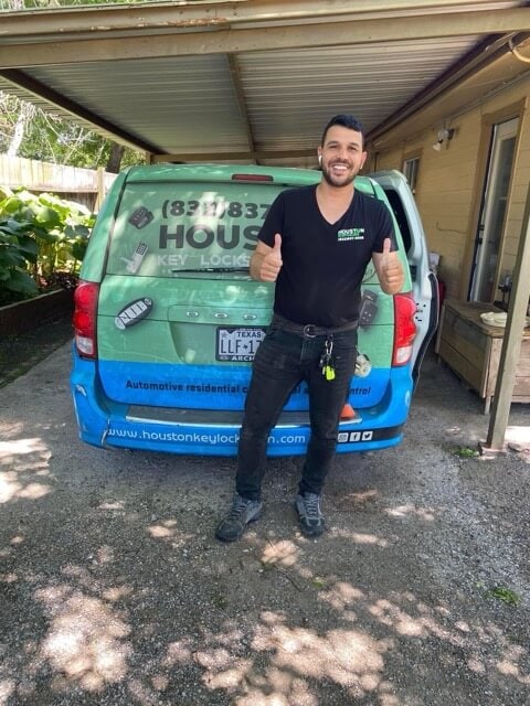 Locksmith servicing a commercial door in Downtown Houston – Houston Key Locksmith