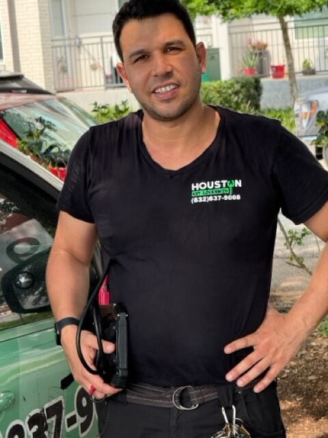 Locksmith West University Place – Houston Key Locksmith technician holding programer for car keys