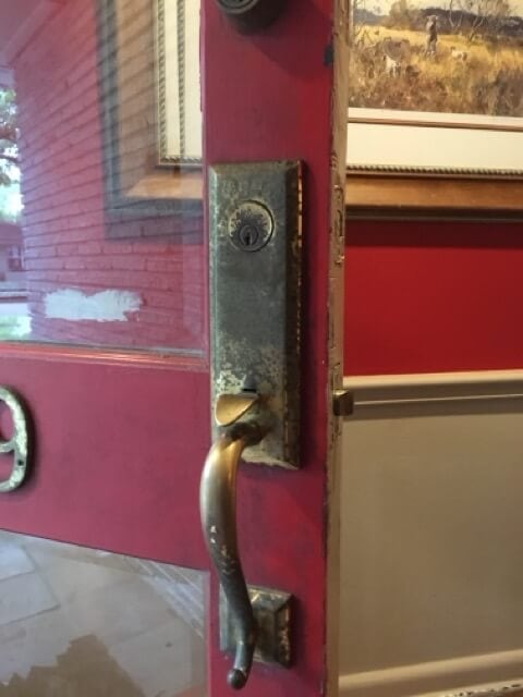Residential locksmith installing and rekey a lock in The Heights Houston – Houston Key Locksmith