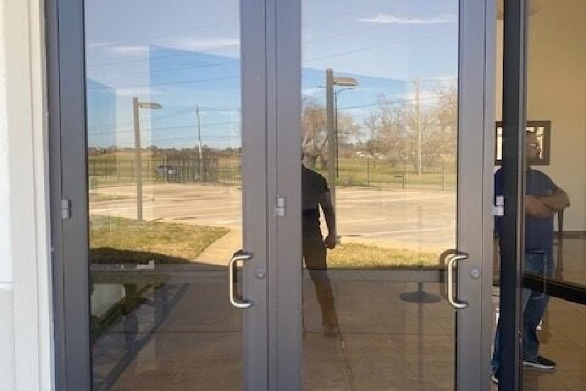 commercial-locksmith-katy-hero Commercial locksmith installing high-security lock at Katy business – Houston Key Locksmith